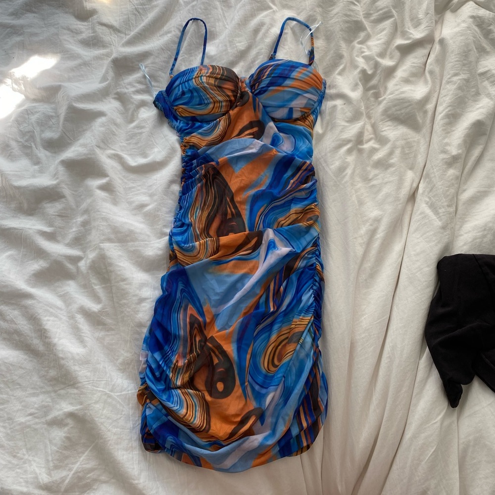 Blue and orange patterned bodycon dress